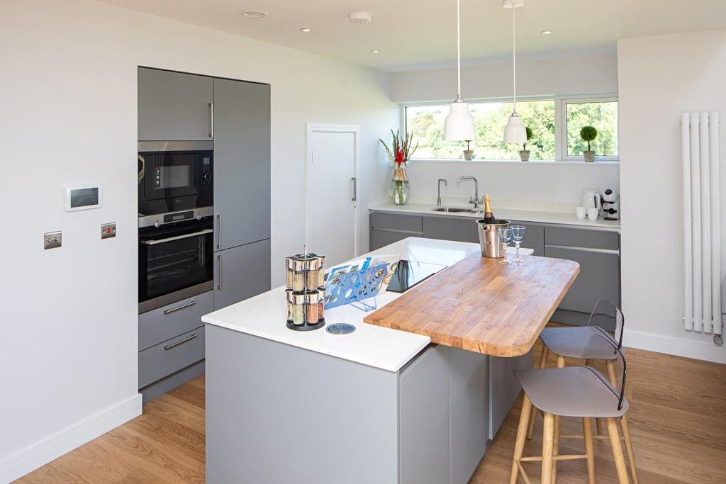 Kitchen with island and breakfast bar