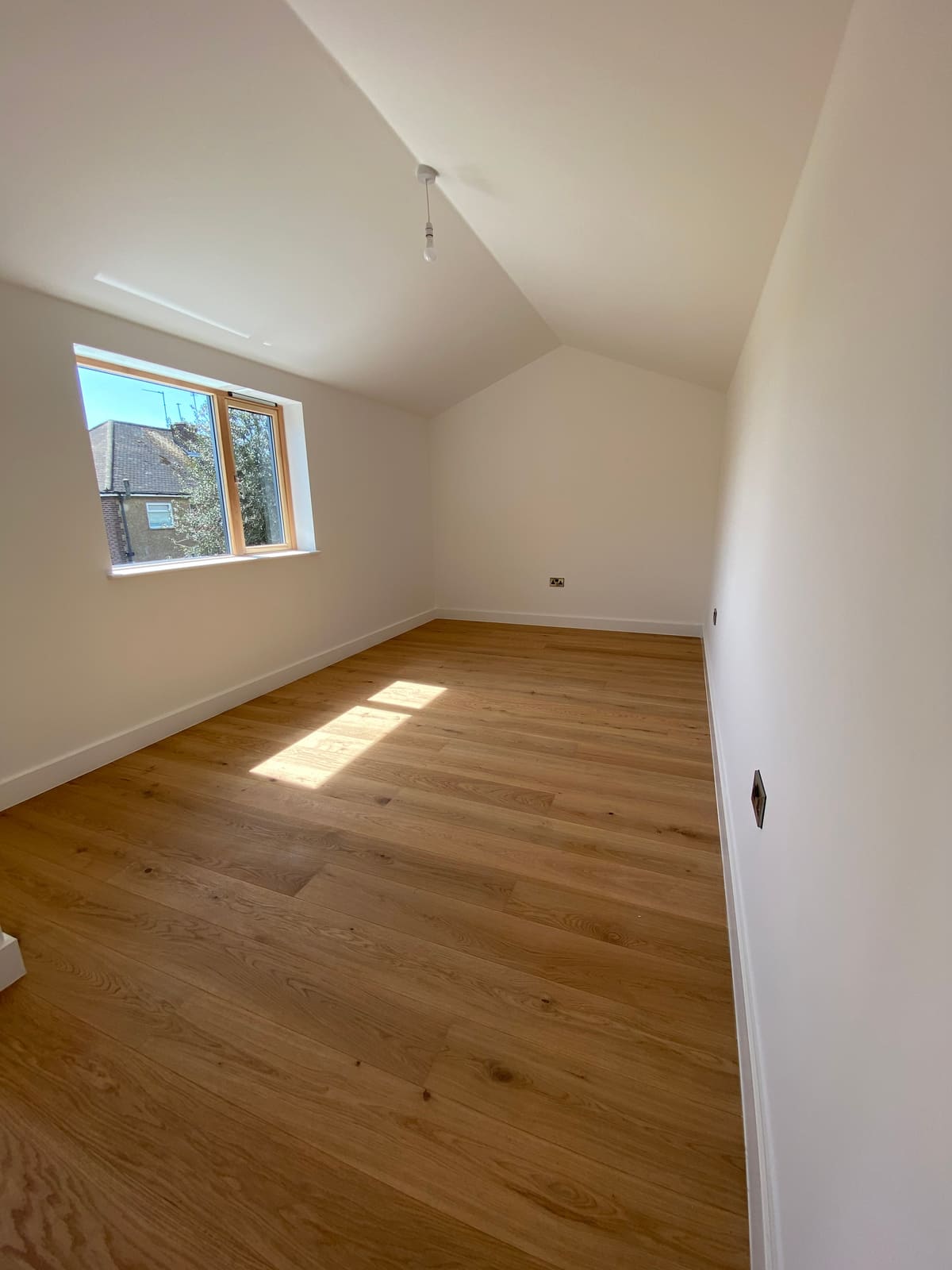 Bedroom with oak floor