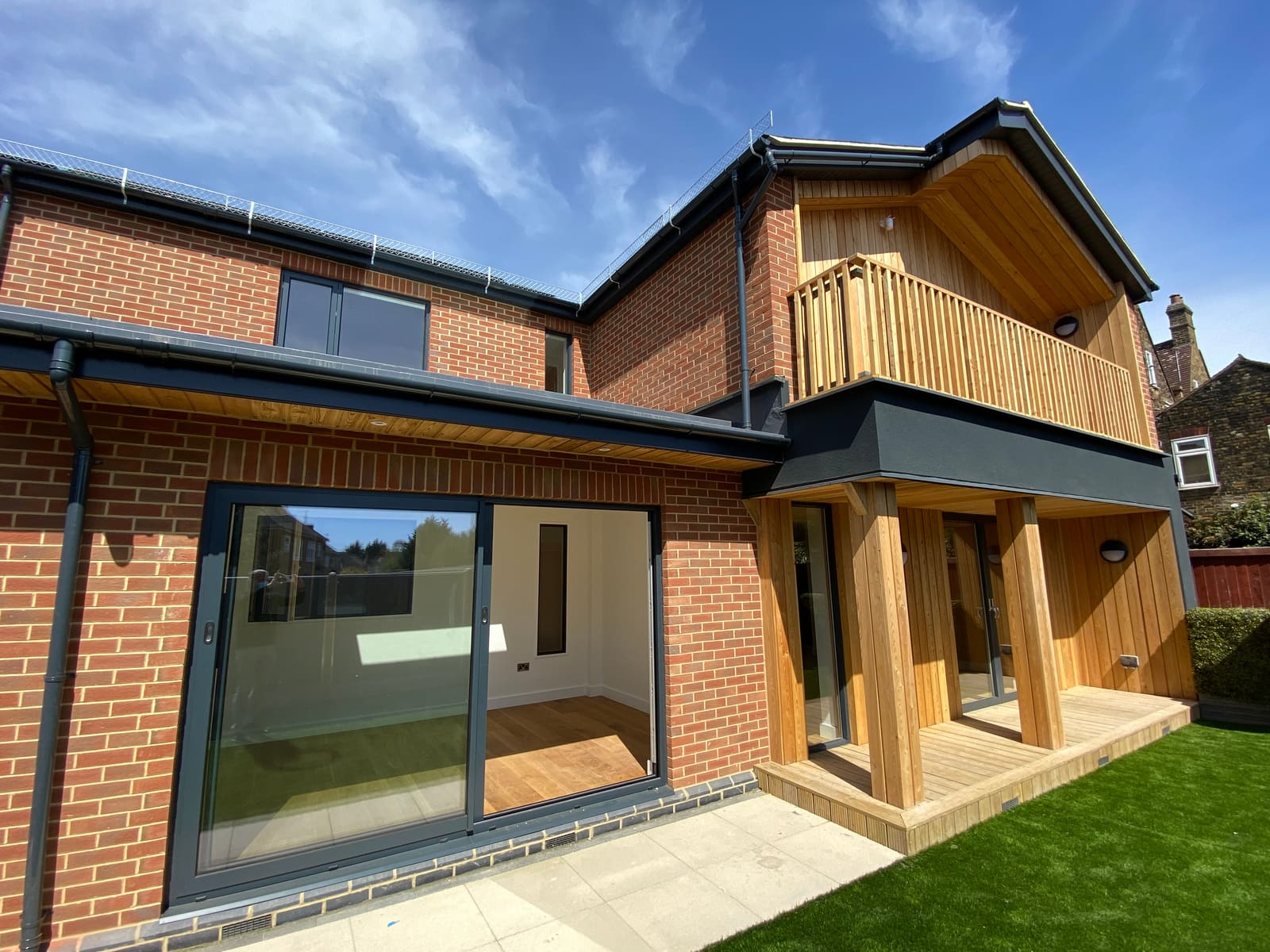 Brick and timber rear elevation with balcony