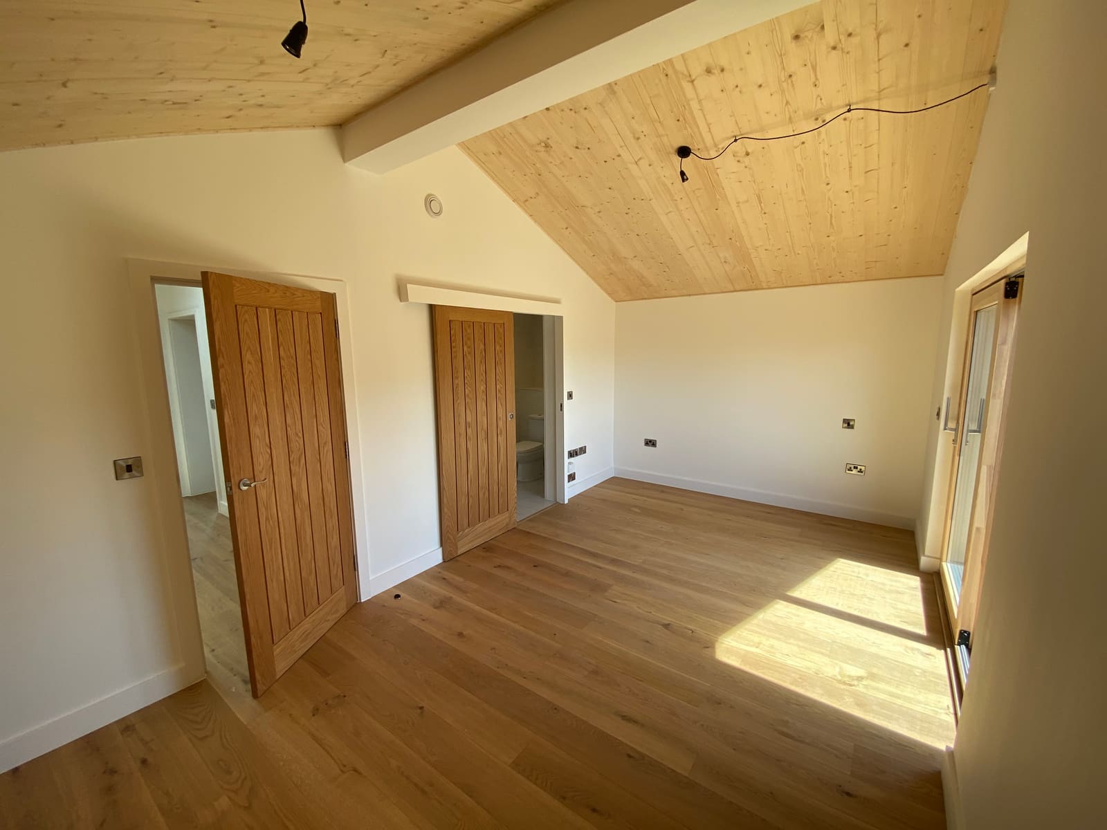 First floor room with a timber ceiling